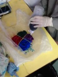 Dye being applied with a squirter bottle