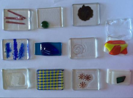 Participant's samples of layering and fusing glass