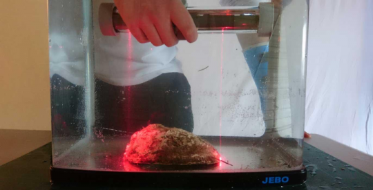 Paua measuring tool being tested in a fish tank