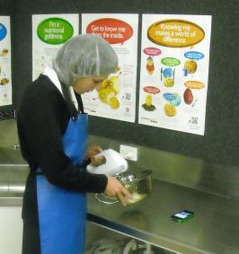 A student mixing ingredients