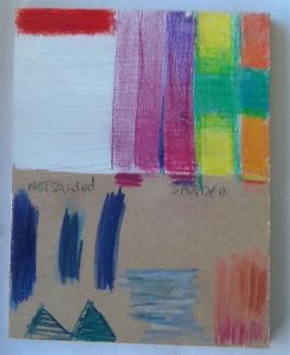 A student's modelling with crayons on MDF
