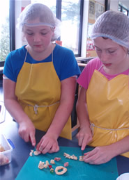 Students preparing ingredients.