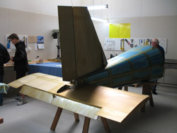 Mounted vertical stabiliser and rudder on tail cone.  