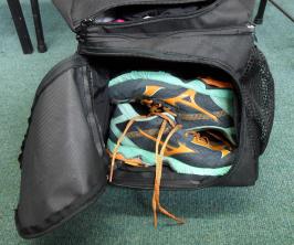 Scholarship student's hockey bag shoe compartment