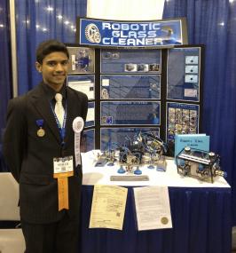 Sohail with his stand at the INTEL fair