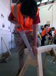 Student with a saw