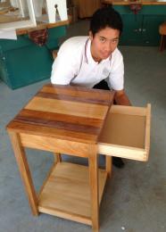 A student displaying his coffee table