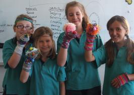 Students with their sock puppets