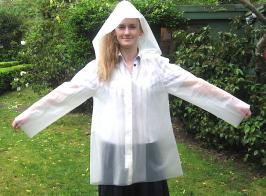 Student in a raincoat she designed