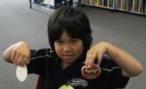  A student with his salt dough medals.